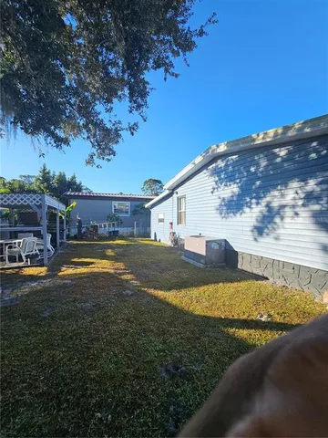 a view of house with outdoor space