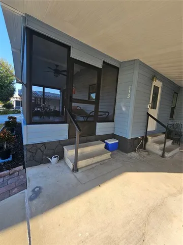 a living room with a couch and a flat screen tv