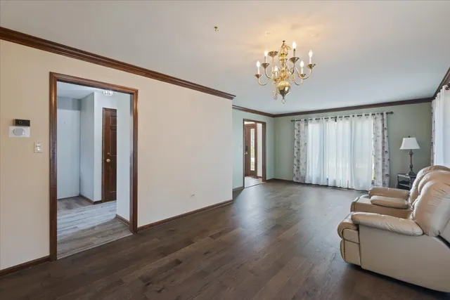 a view of a livingroom with furniture and wooden floor
