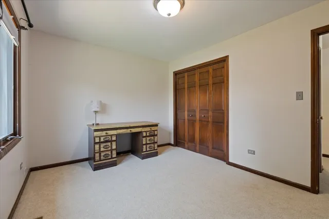 a view of a hallway with stairs