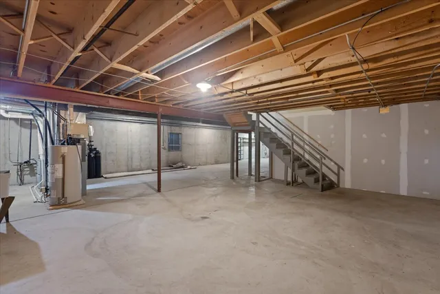 a bathroom with a shower and a sink