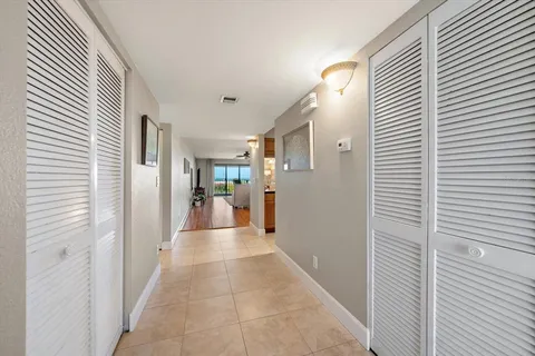 a view of a hallway with a sink
