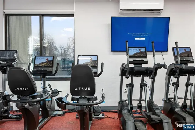 a view of a workspace with gym equipment