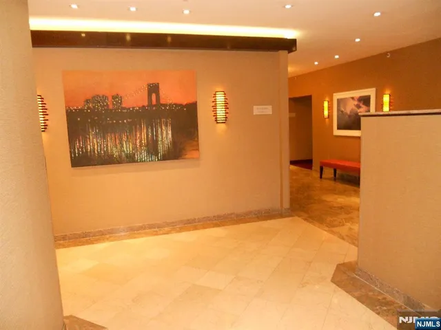 a view of a refrigerator in a kitchen