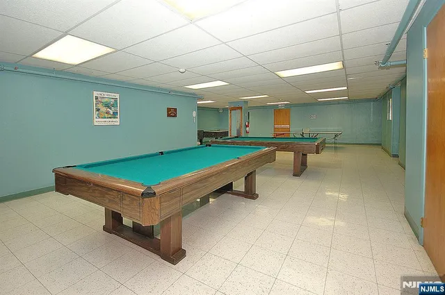 a view of an empty room with a gallery