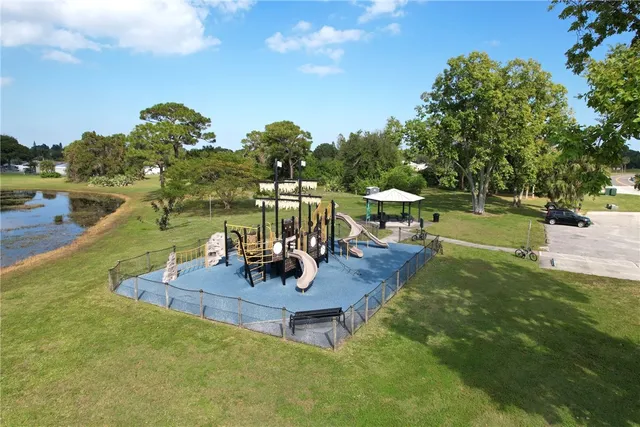 a view of a swimming pool with a patio