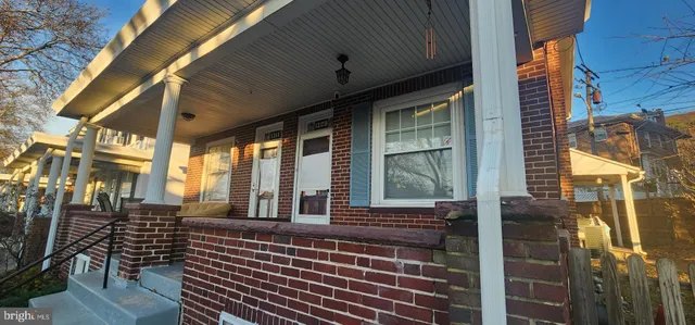 a view of a house with a porch
