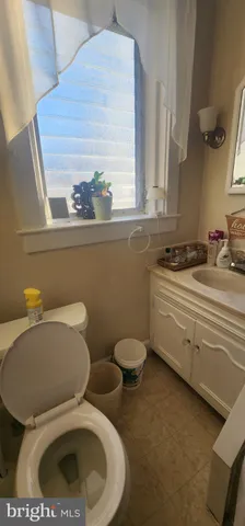 a bathroom with a toilet and a sink
