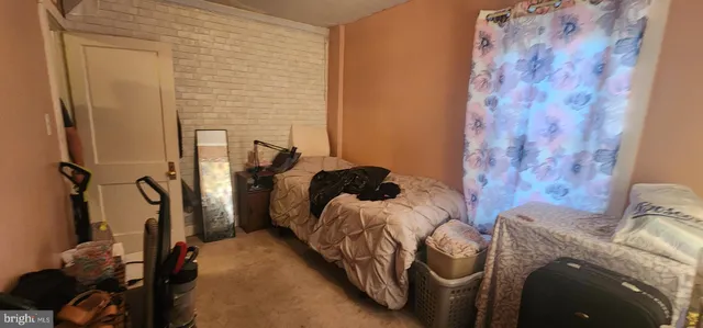 a bed room with a bed and a couch