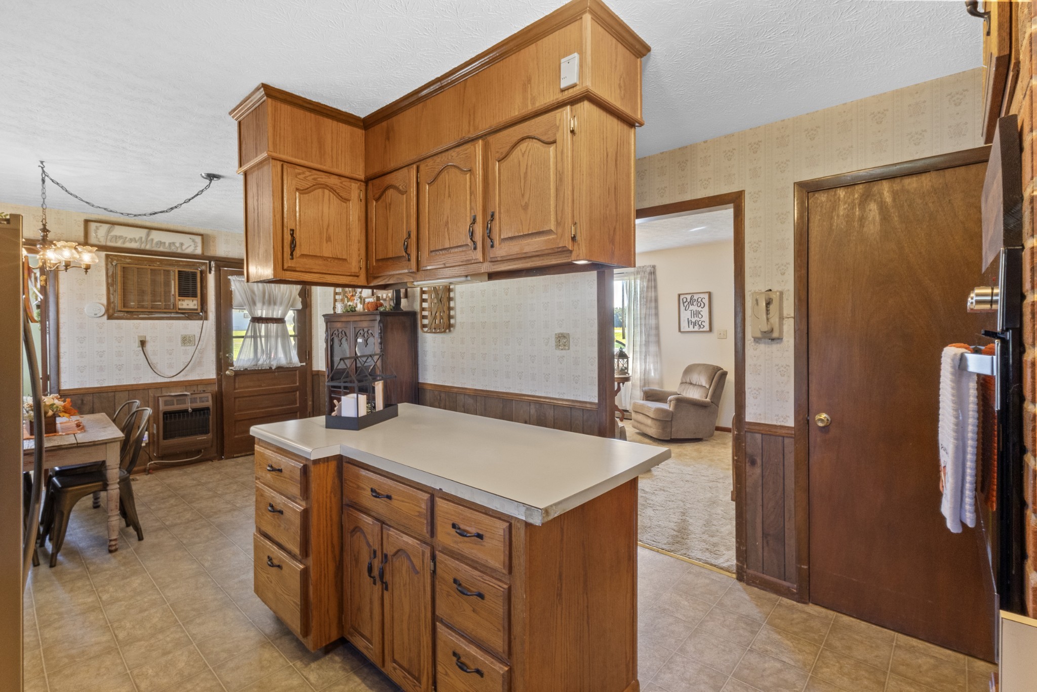 2487 Highway 52 West Portland, TN 37148 - Photo 12 of 49 a kitchen that has a cabinets and a refrigerator