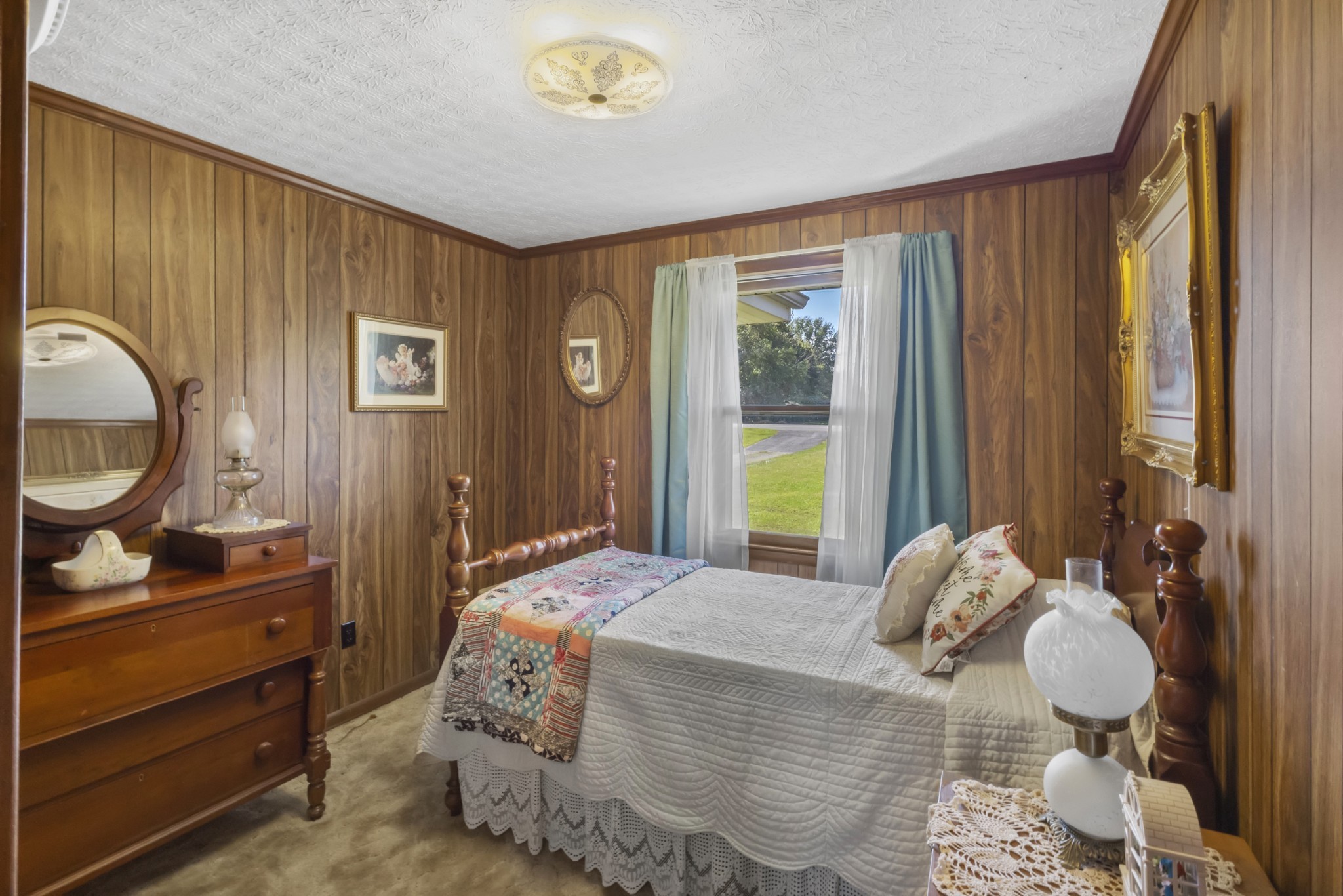 2487 Highway 52 West Portland, TN 37148 - Photo 19 of 49 a bedroom with a bed and wooden floor