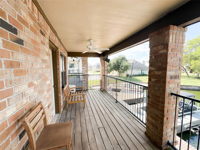 a view of a house with wooden floor and outdoor space