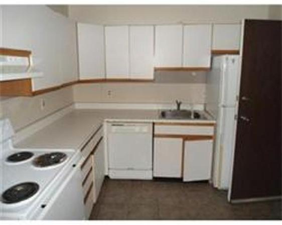 302 Boston Post Road East, Unit B2 Marlborough, MA 01752 - Photo 2 of 6 a kitchen with a sink stove and refrigerator