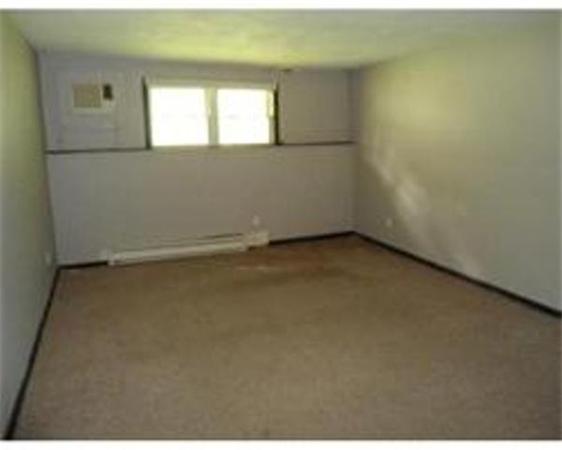 302 Boston Post Road East, Unit B2 Marlborough, MA 01752 - Photo 5 of 6 an empty room with a window