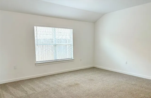 a outdoor living space with furniture and a window