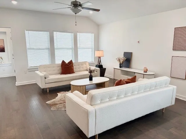 a view of a hallway with a painting on the wall