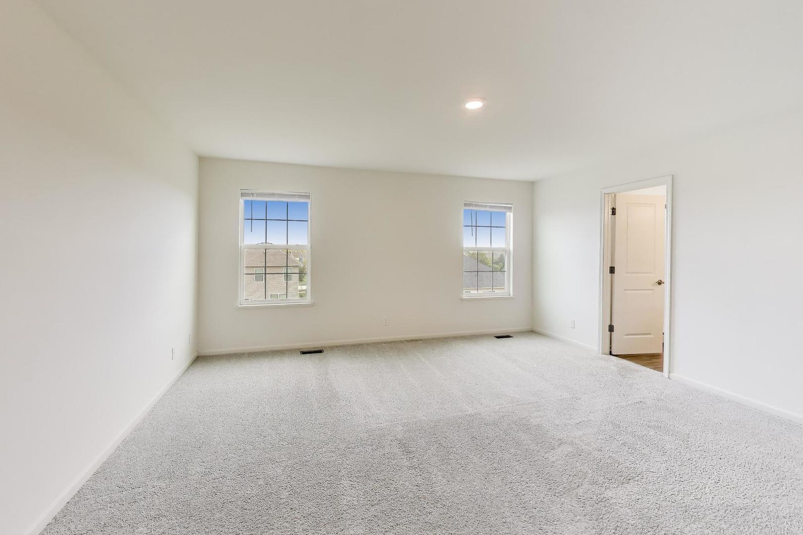 2058 Ingemunson Lane Yorkville, IL 60560 - Photo 18 of 55 an empty room with windows