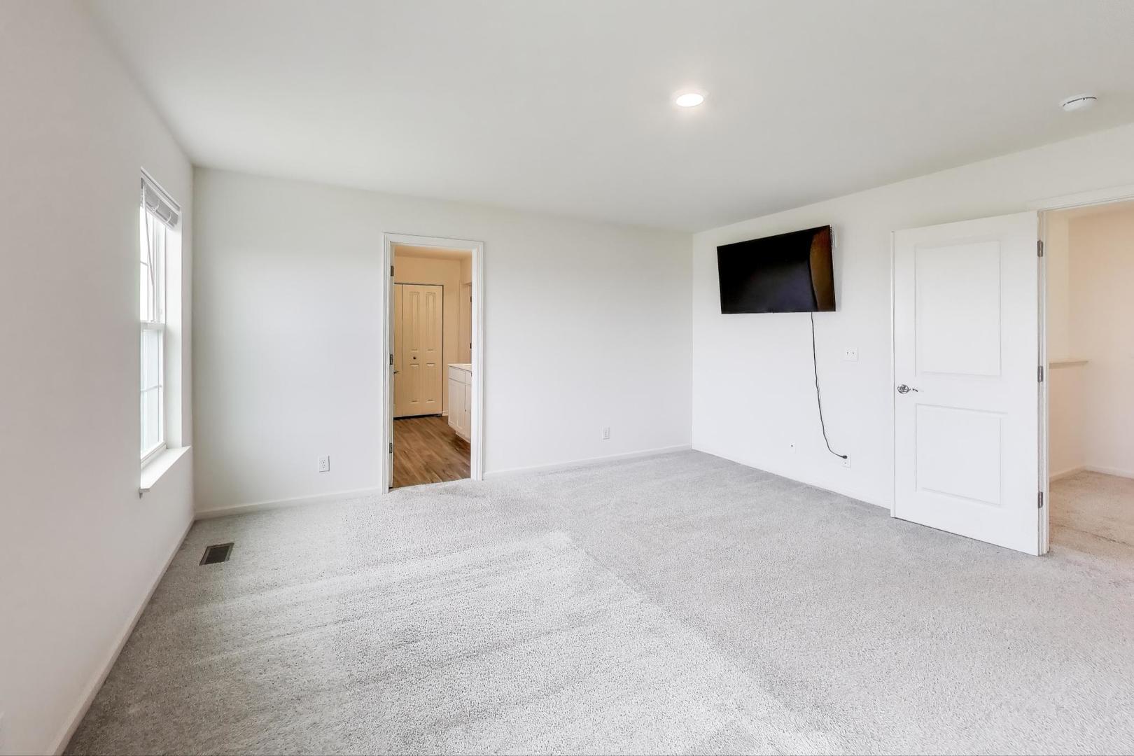 2058 Ingemunson Lane Yorkville, IL 60560 - Photo 19 of 55 a view of an empty room with a window