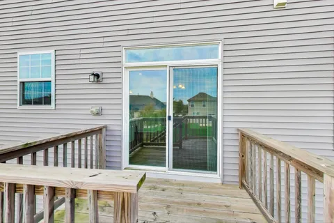 a backyard of a house with a yard and garage