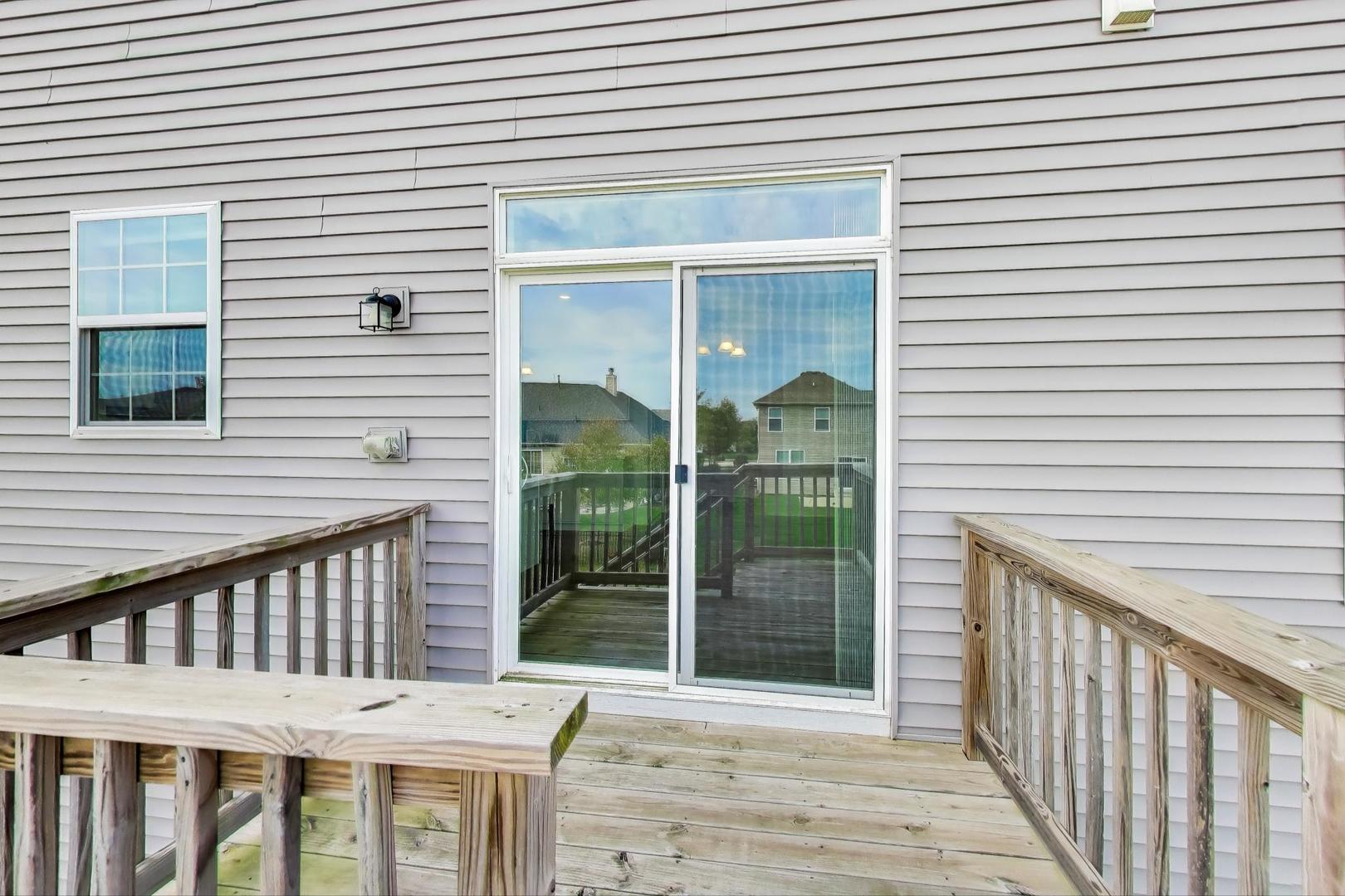 2058 Ingemunson Lane Yorkville, IL 60560 - Photo 34 of 55 a view of a house with a porch