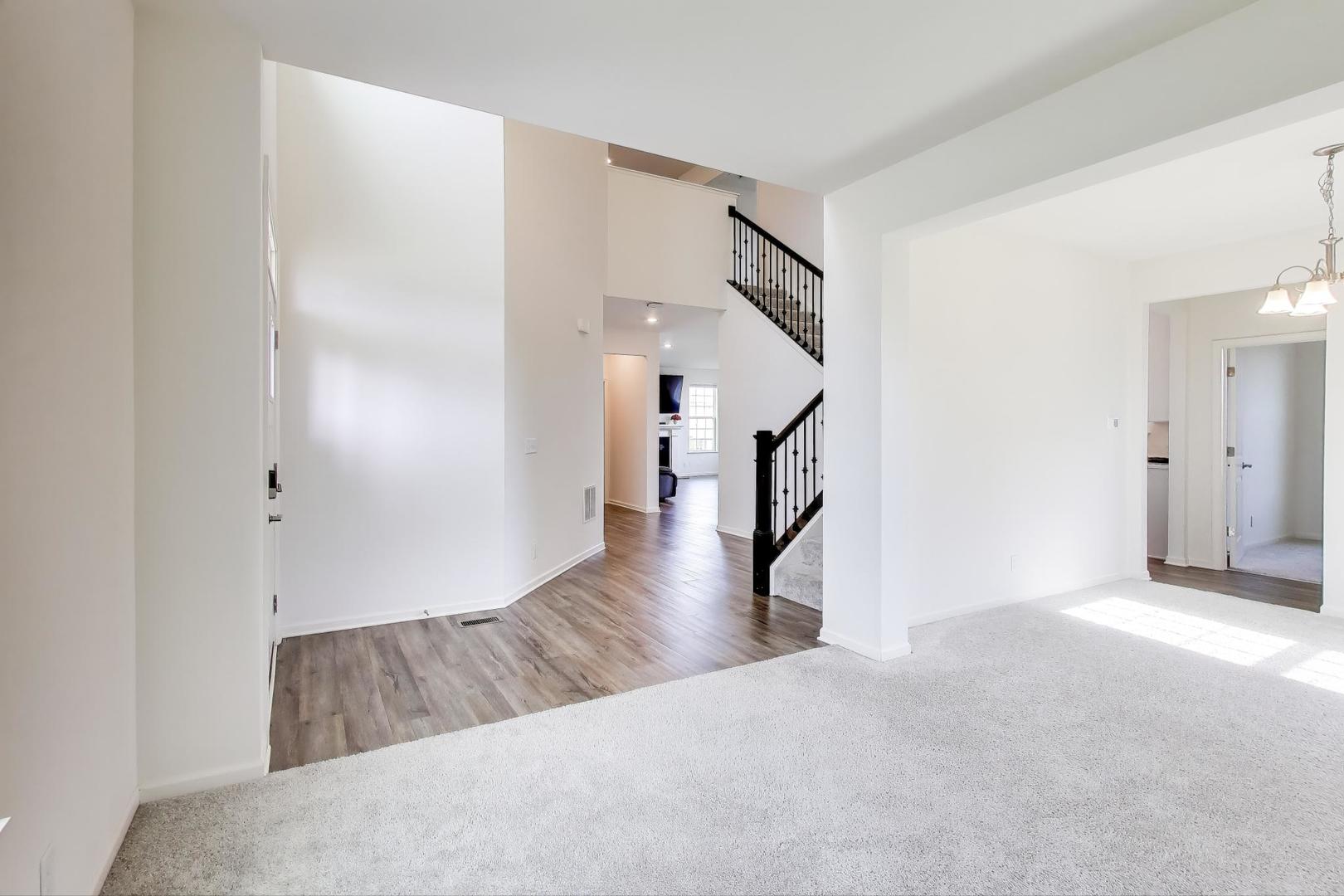 2058 Ingemunson Lane Yorkville, IL 60560 - Photo 9 of 55 a view of a hallway view with staircase
