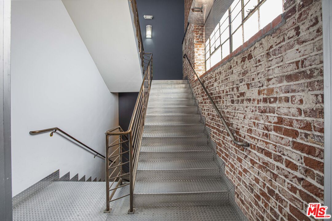 652 Mateo Street, Unit 303 Los Angeles, CA 90021 - Photo 11 of 12 a view of entryway with a front door