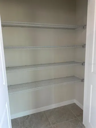 a view of a glass door and a window