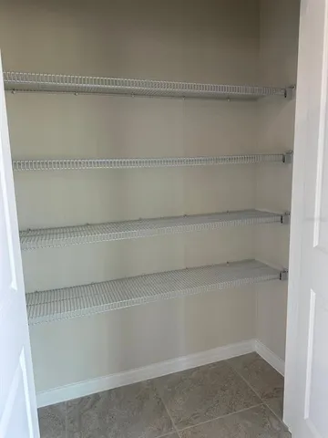 a view of a glass door and a window