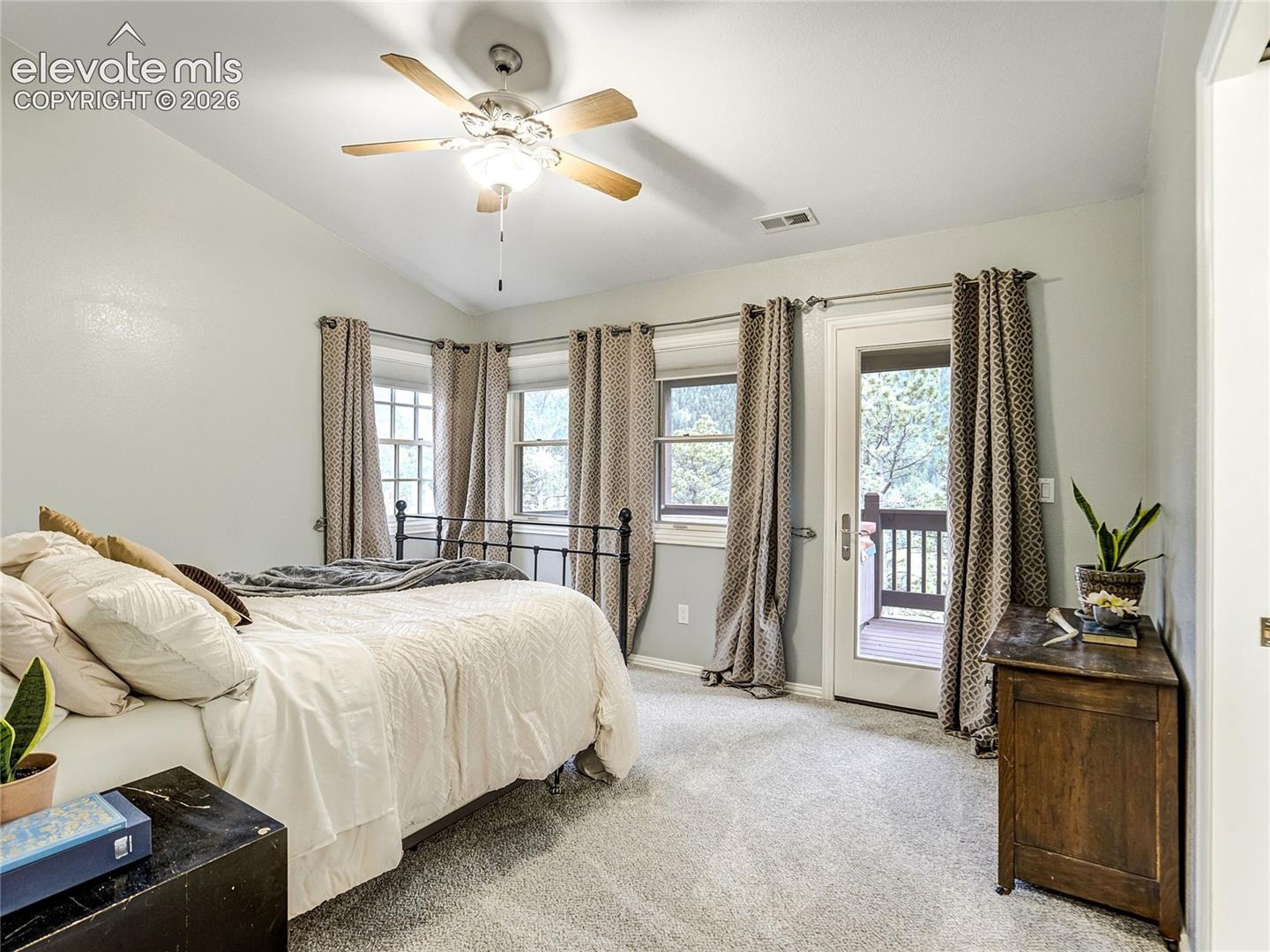 4660 Hagerman Road Cascade, CO 80809 - Photo 8 of 50 Primary bedroom with a private balcony with hot tub and mountain views that will melt the stress away.