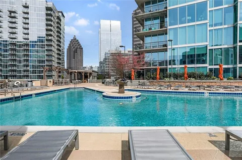 a swimming pool with outdoor view