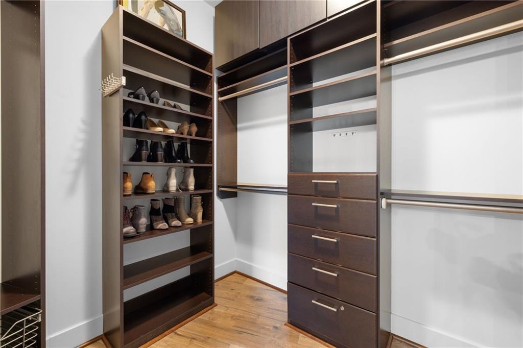 1080 Peachtree Street Northeast, Unit 1812 Atlanta, GA 30309 - Photo 5 of 13 a view of walk in closet with empty racks