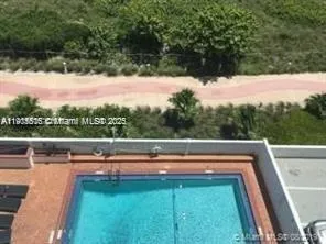 a view of outdoor space with swimming pool