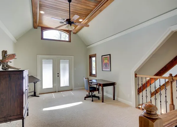 a view of a livingroom with furniture and a furniture