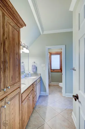 a bathroom with a sink and mirror