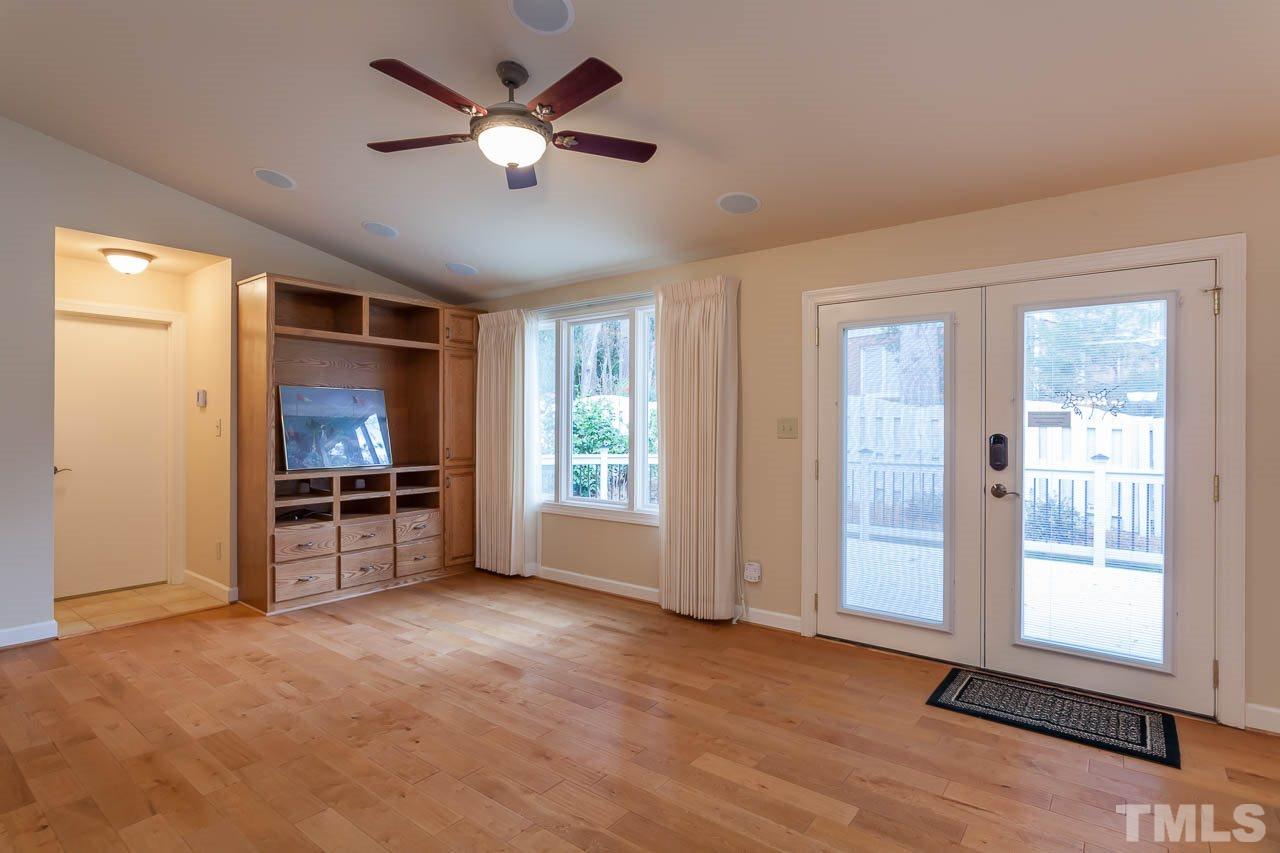 6909 Valley Ridge Court Raleigh, NC 27615 - Photo 12 of 25 a view of a livingroom with a flat screen tv