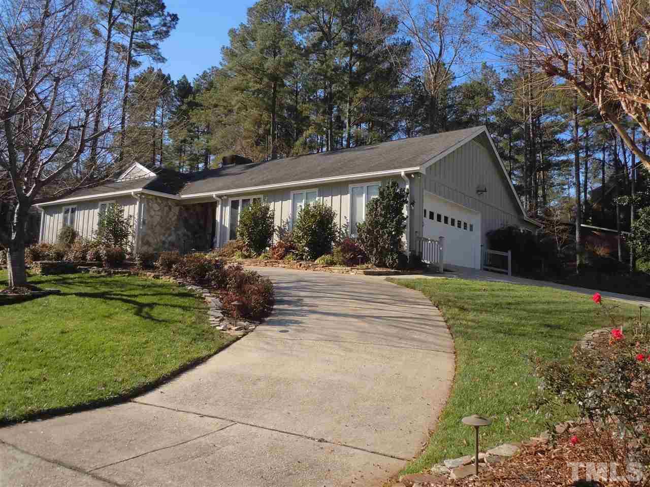 6909 Valley Ridge Court Raleigh, NC 27615 - Photo 3 of 25 a view of house with outdoor space and garden