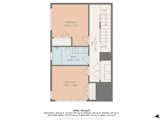 a picture of a bench in front of a wall