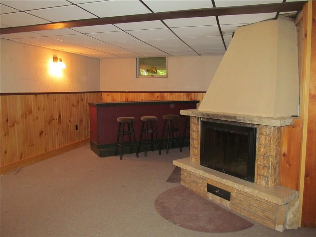 7 Little River Road North Berwick, ME 03906 - Photo 18 of 20 Family room with fire place and bar....