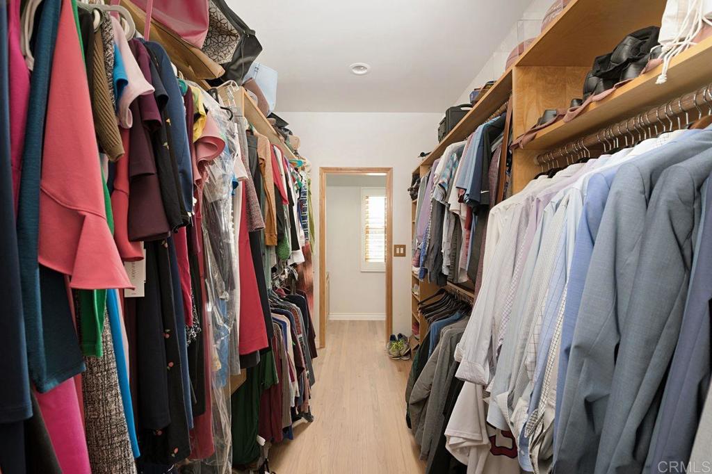 3743 Via Cielo Azul Alpine, CA 91901 - Photo 19 of 34 a view of walk in closet with clothes and shoes