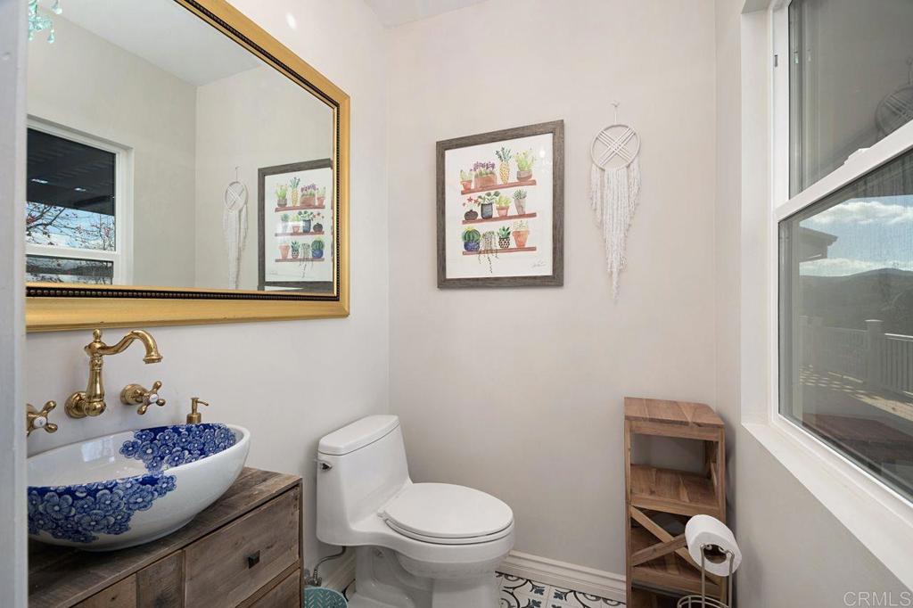 3743 Via Cielo Azul Alpine, CA 91901 - Photo 21 of 34 a bathroom with a toilet
