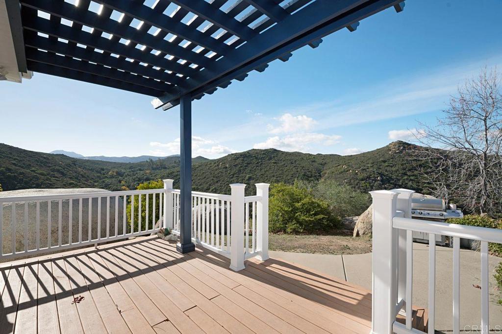 3743 Via Cielo Azul Alpine, CA 91901 - Photo 6 of 34 a view of balcony with wooden floor and fence