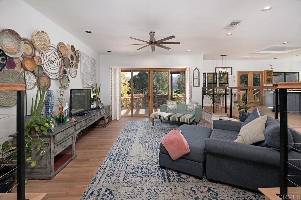 3743 Via Cielo Azul Alpine, CA 91901 - Photo 7 of 34 a living room with furniture and a flat screen tv