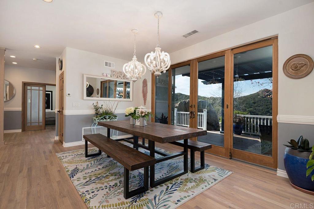 3743 Via Cielo Azul Alpine, CA 91901 - Photo 9 of 34 a view of a dining room with furniture window and wooden floor