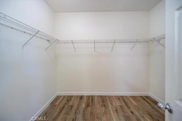 a view of empty room with windows