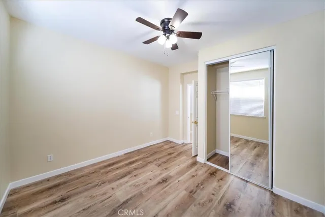 a bathroom with a double vanity sink mirror and shower