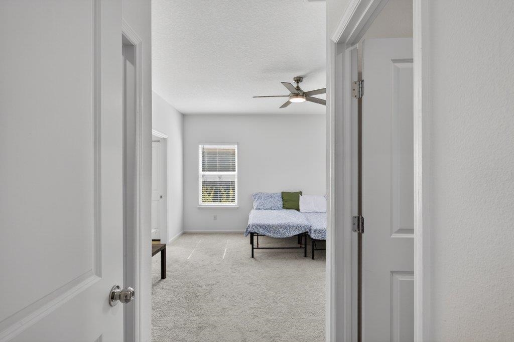 210 White Rabbit Run St. Augustine, FL 32092 - Photo 39 of 85 a view of a room with lounge chair and windows