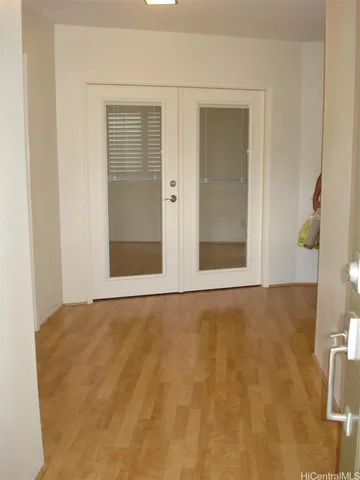 view of an empty room with a window