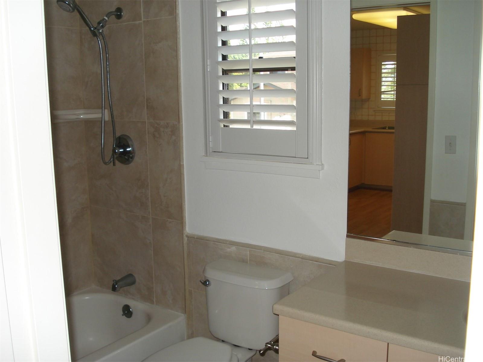 95-1007 Paepae Street, Unit 2 Mililani, HI 96789 - Photo 6 of 8 a bathroom with a shower