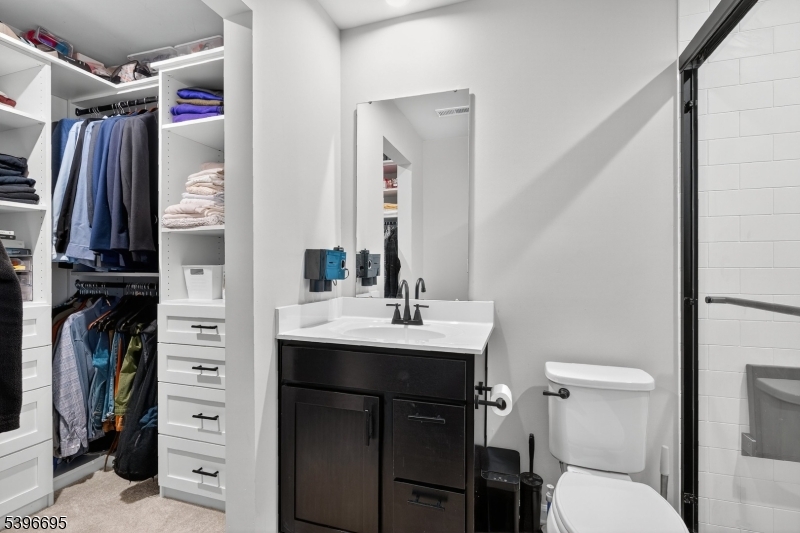 55 Limestone Boulevard Washington, NJ 07882 - Photo 16 of 25 a bathroom with a sink a toilet and shower