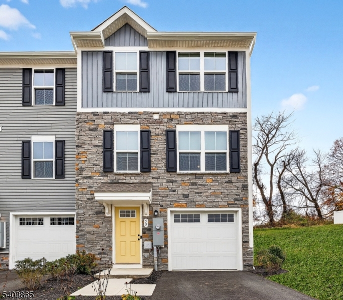 55 Limestone Boulevard Washington, NJ 07882 - Photo 2 of 24 a front view of a house with a yard